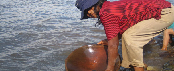 panning for gold in the napo river at Kamak Maki in the Amazon in Ecuador 