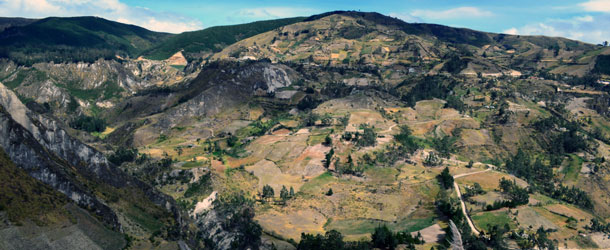 An intern on a global citizenship program in the Andes of Ecuador works on a project with children and adults